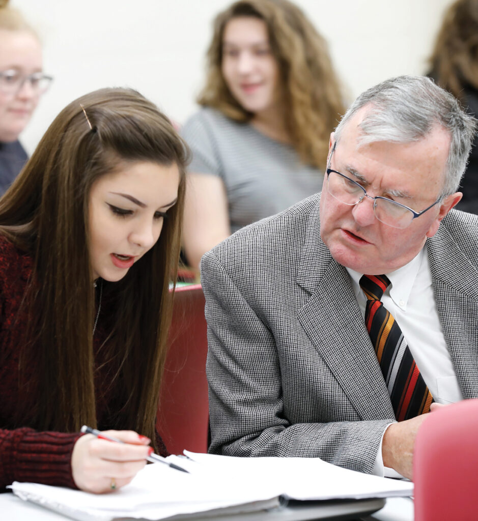 business student and professor